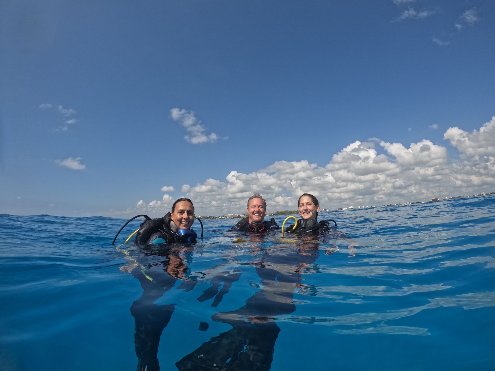 Happy divers after their first scuba diving experience